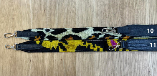 Silk carpet and leather shoulder strap